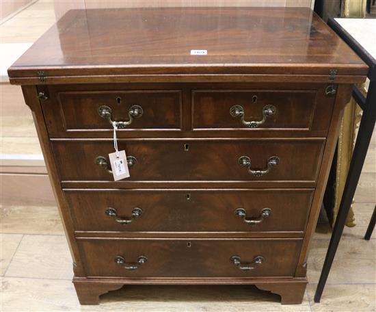 A reproduction mahogany bachelors chest, 68cm wide